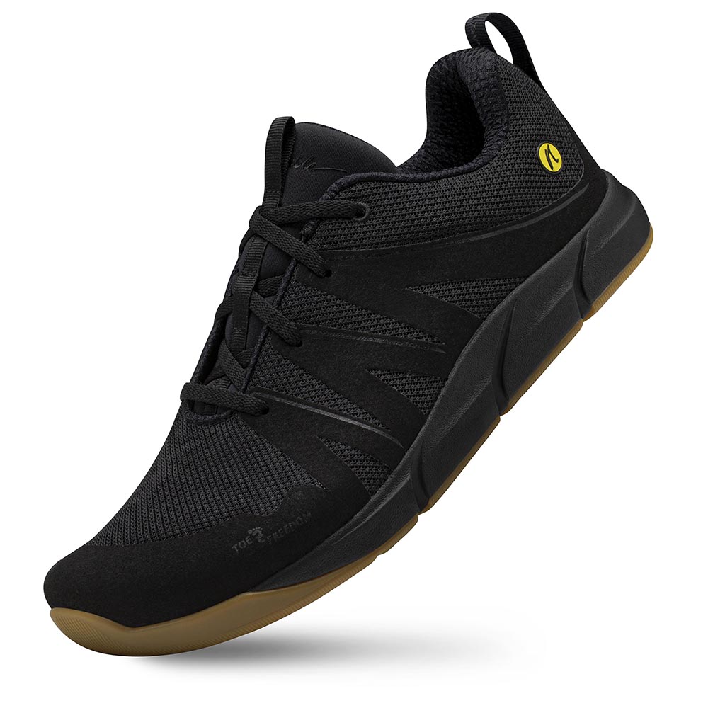 Der Joe Nimble Addict Laufschuh in schwarz braun auf der Spitze stehend