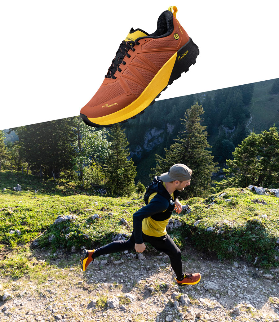 Closeup des Joe Nimble Trail Addict Pro-R Traillaufschuh in braun und mit Trailläufer in Aktion