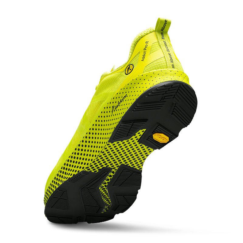 Die Vibram Sohle des Joe Nimble Addict Pro-R Laufschuh in Gelb